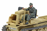 A detailed scale model of a German military bulldozer with a seated soldier figure, shown against a plain white background.